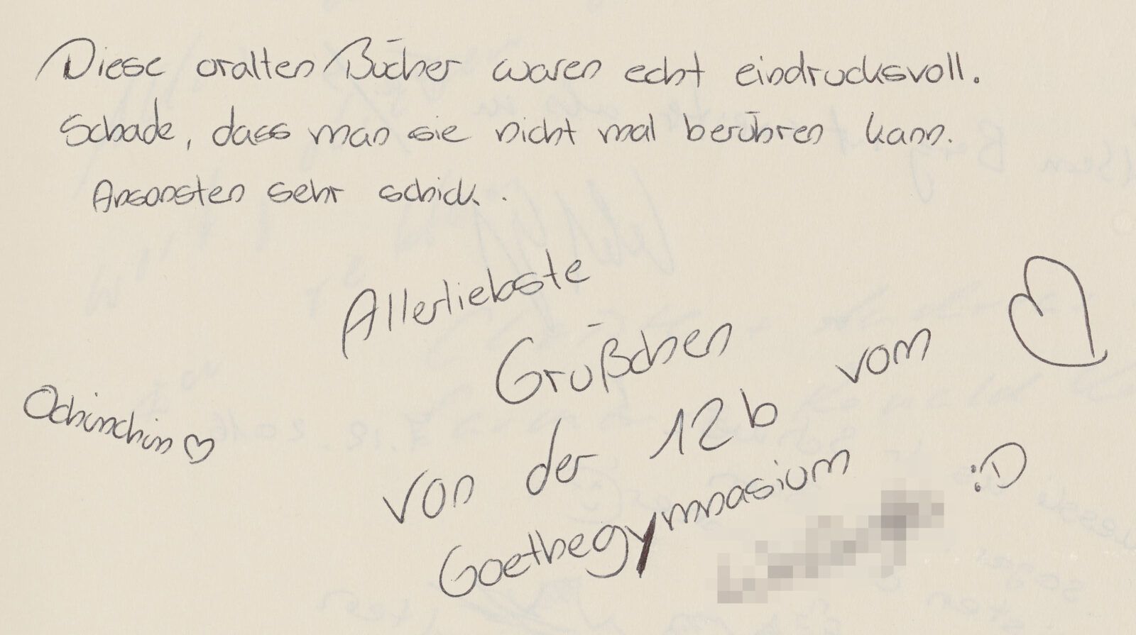 Eintrag im Gästebuch einer 12. Klasse, die es bedauert, dass die alten Bücher nicht berührt werden dürfen