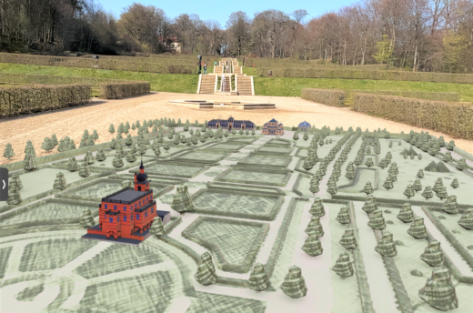 Das Foto zeigt einen barocken Garten, in dem eine digitale Rekonstruktion des alten Zustands eingebettet ist.